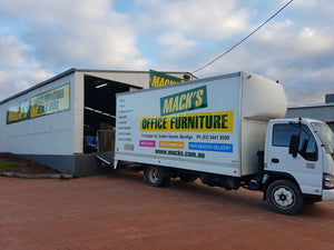 FREE Delivery, Assembly &  Installation in Bendigo. An image of one of the trucks from the Mack's Office Furniture fleet. 